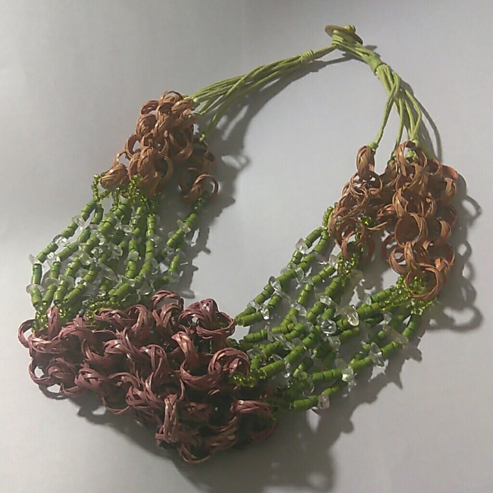 Handmade bead and woven necklace.